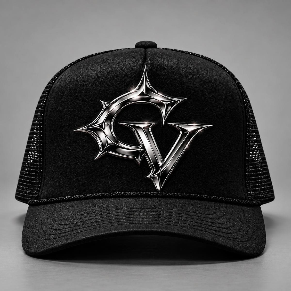 GV Trucker Hat — front, chrome GV emblem on black mesh trucker. Concept render, internal review only.